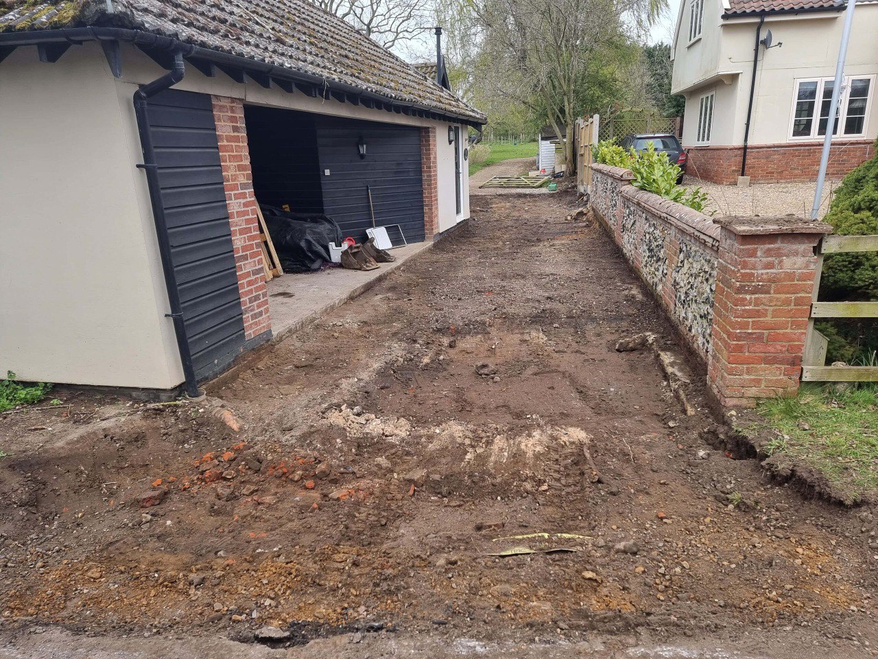 This is a tarmac driveway that is in the process of being dug out and installed by Wisbech Driveways
